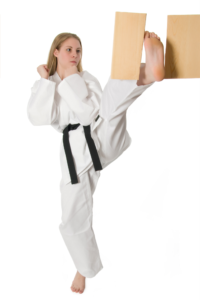 karate girl breaking a board