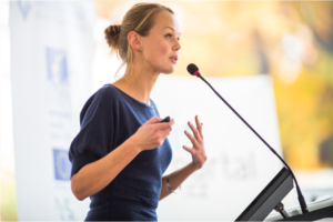 woman speaking at mic 