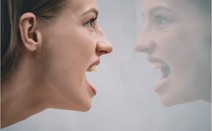 bully woman yelling at her reflection